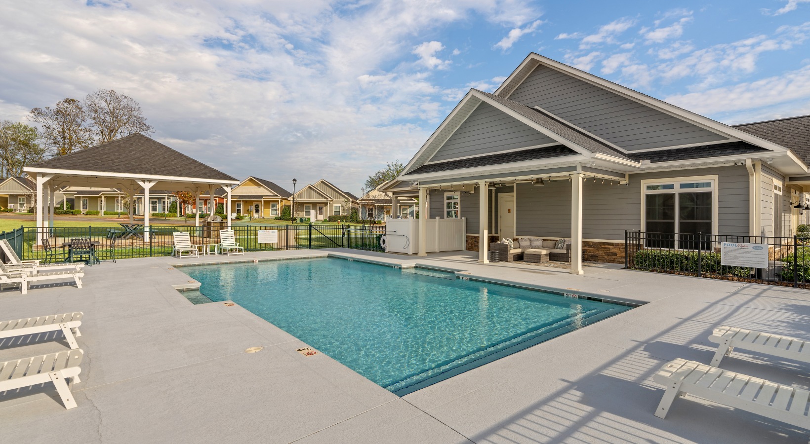 Resort-style pool and lounge at Cottages Dothan in Dothan, Al 