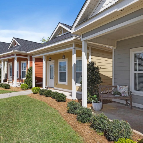 well manicured lawns in front of cottages